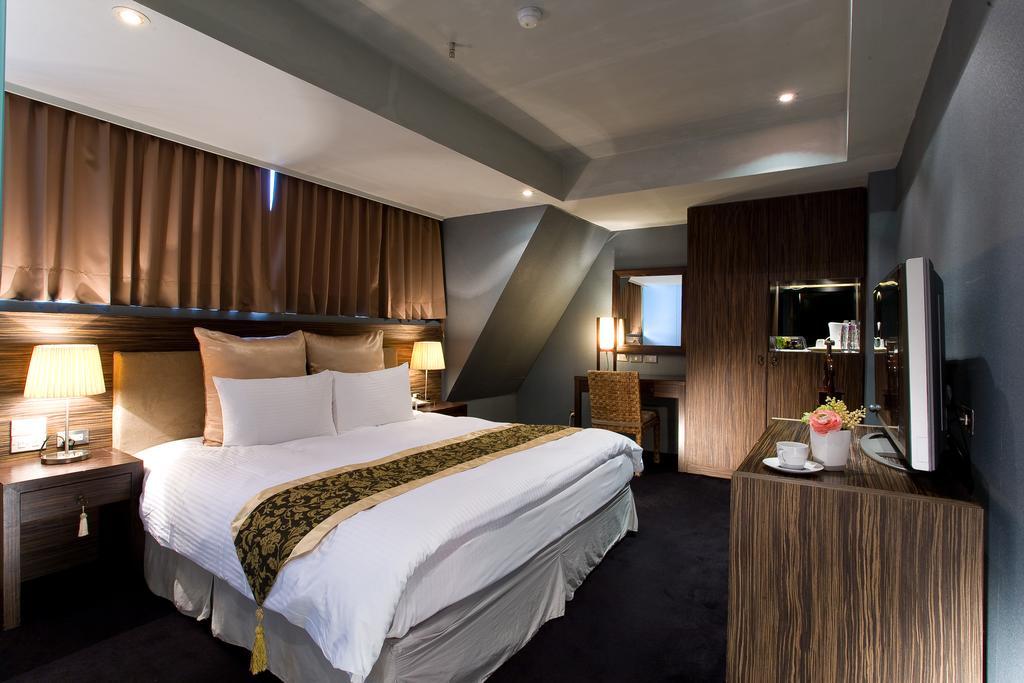 H.M.Hotel Hsinchu by Rom bilde