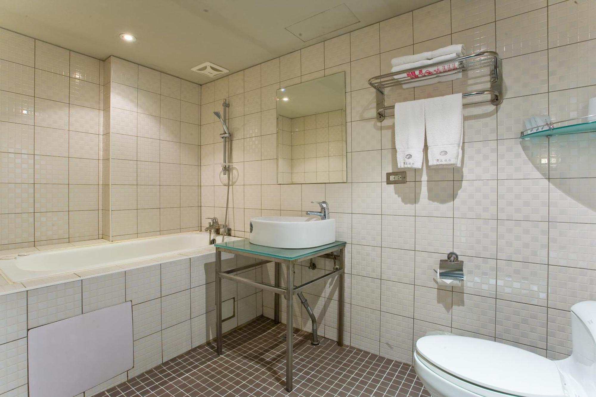 H.M.Hotel Hsinchu by Rom bilde