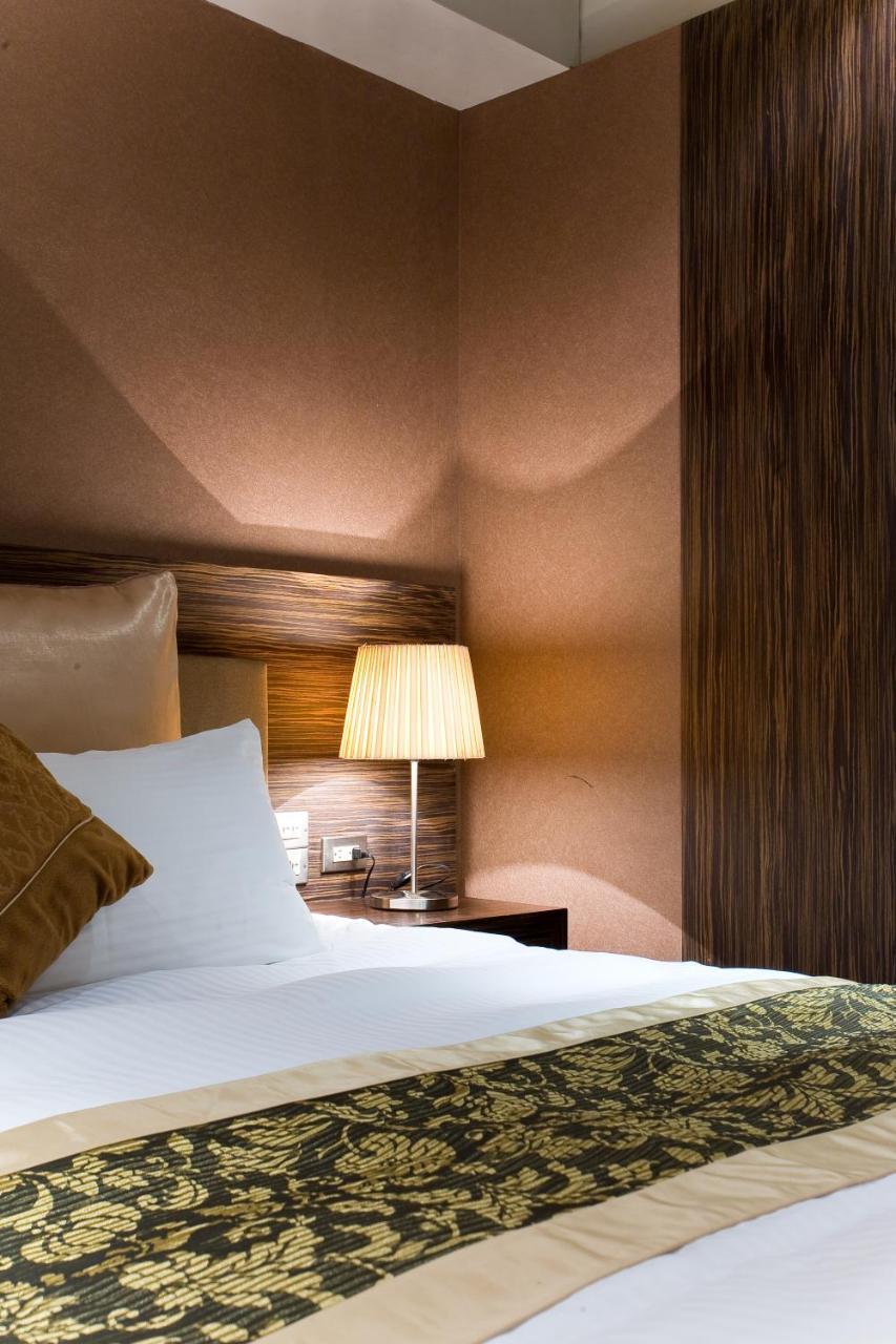H.M.Hotel Hsinchu by Rom bilde
